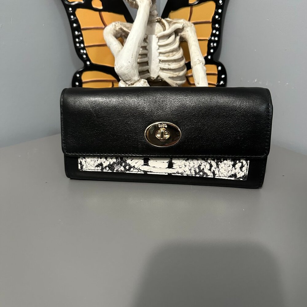 COACH Turnlock Slim Wallet on a chain